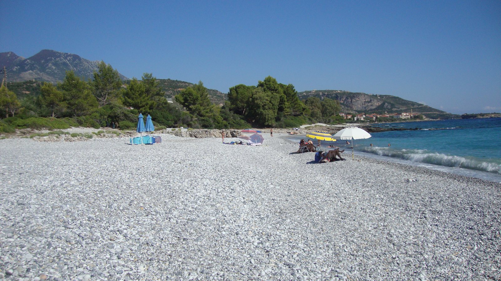 White pebbles and clear turquoise water at Ritsa beach, Kardamyli